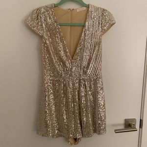Gold sequin romper.